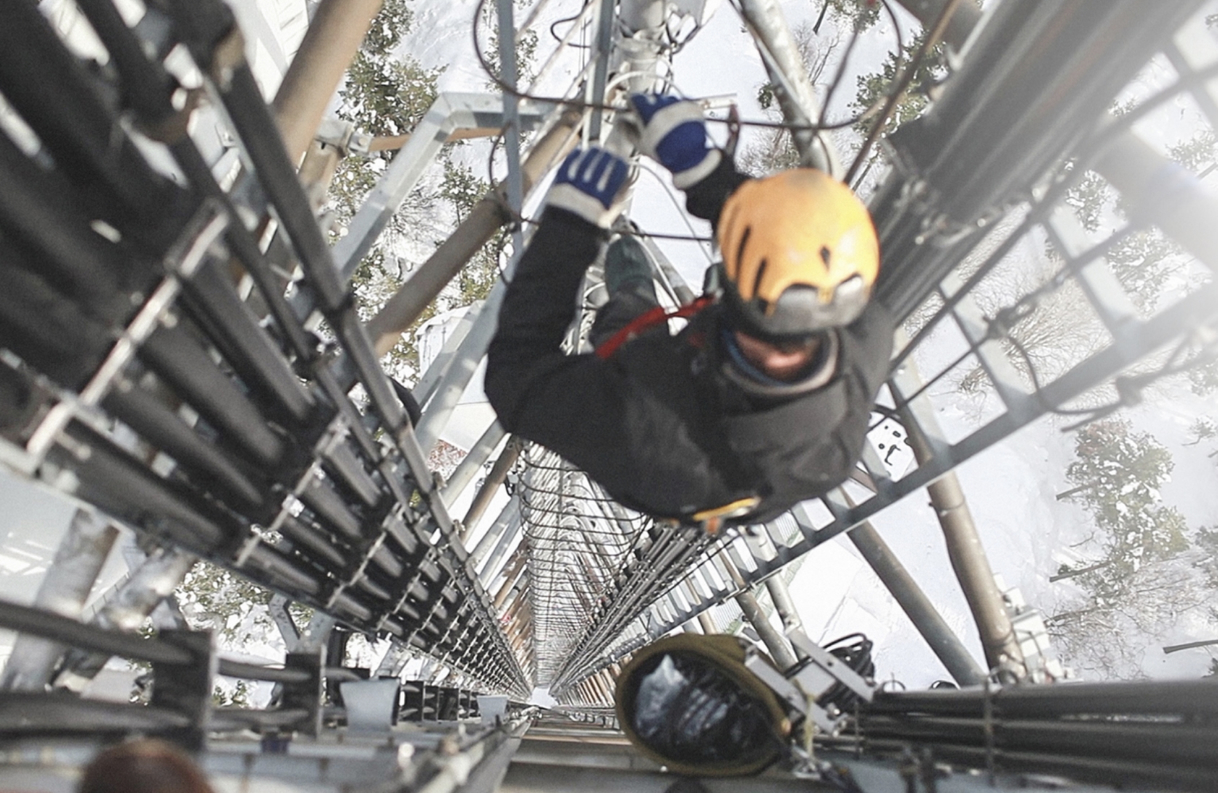 guy climbing uptower