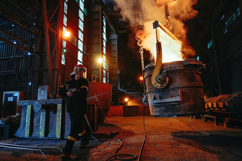 worker with molten metal