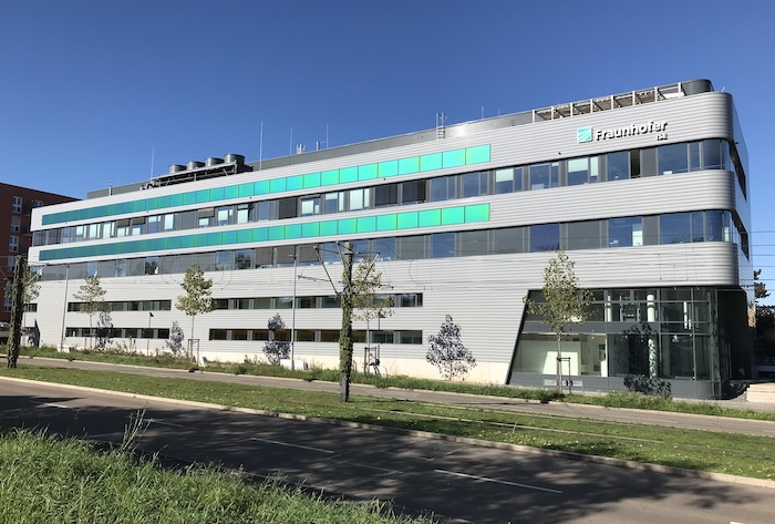 building with green. panels