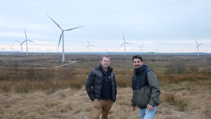 2 guys and wind turbines