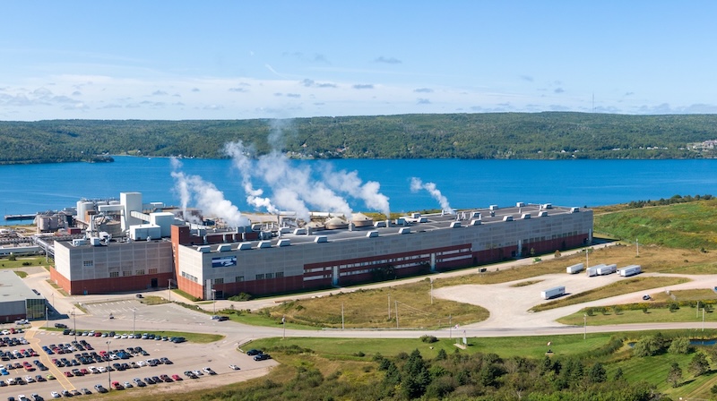 smokestacks and lake