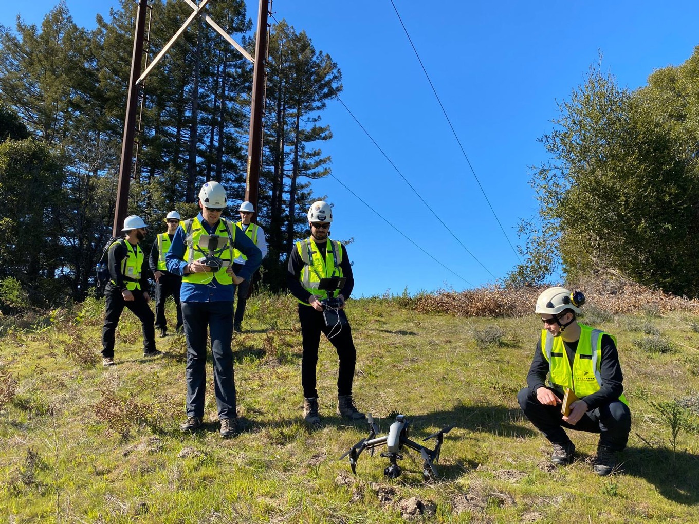 yellow hard hats forest drone